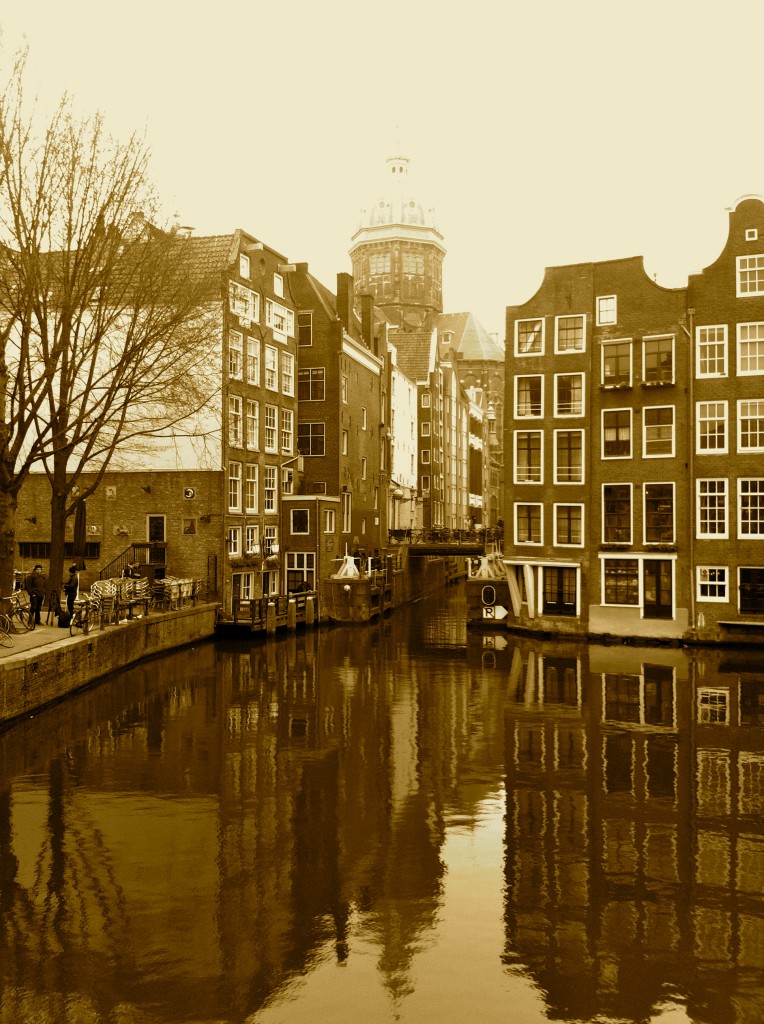 Walking across one of the many canals in A'dam.