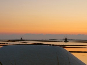 I made Pippo pull over the car for this warm sunset while driving by the Mediterranean sea salt fields.